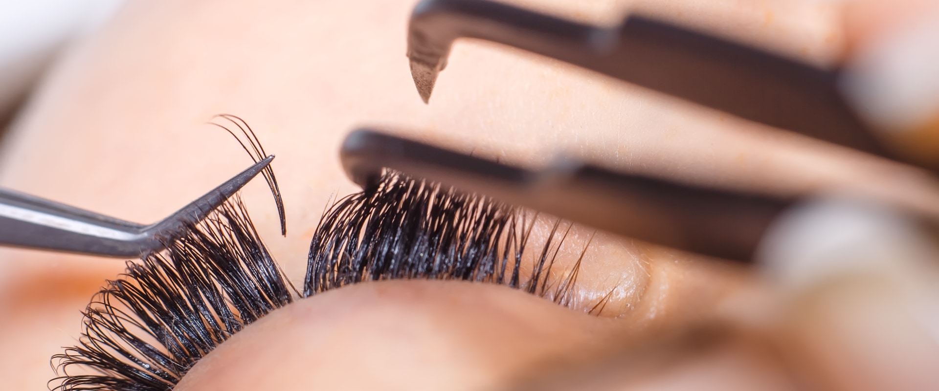 What do eyelash extensions attach to?